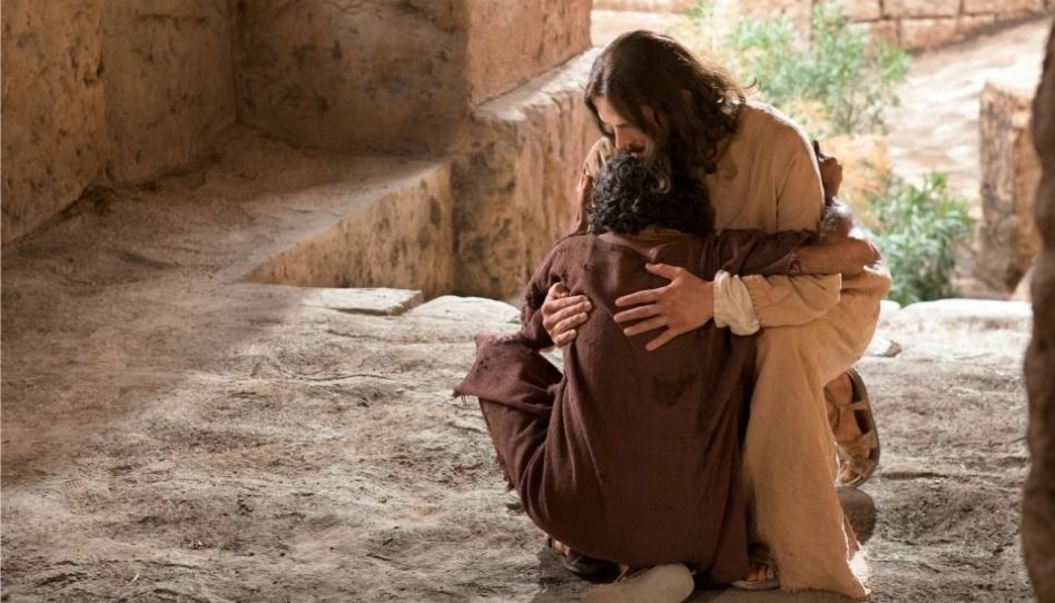 Jesus Cristo abraçando um seguidor.